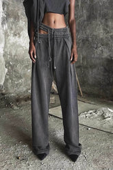Pantalon de survêtement à jambes larges et taille élastique à découpes asymétriques